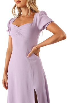 Charming puff sleeves frame this day-to-night dress designed with a sweetheart neck and a flared skirt. Hidden back-zip closure Sweetheart neck Short sleeves Unlined 50% rayon, 50% viscose Hand wash, dry flat Imported Purple Puff Sleeve Dress, Winter Bridesmaid, Purple Satin Dress, Winter Bridesmaids, Winter Bridesmaid Dresses, Petal And Pup, Banquet Dresses, Day To Night Dresses, Puff Sleeve Dress