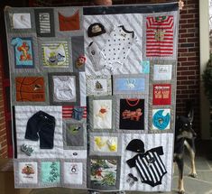 a dog is standing next to a quilt