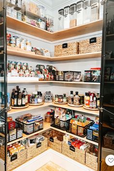 an organized pantry with baskets and food items