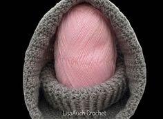 a ball of yarn wrapped in a crochet bag on a black background with the text,'lisbauch for crochet '