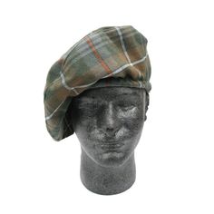 Every good Celt needs a proper, authentic, Homespun Tartan Tam. Your friends will turn green with farmad (envy) when you show up wearing your new, hand-spun matching Tam and kilt! These hats are also great on their own, to add some spice to your fall and winter outerwear. The drawstring means no worrying if the Tam will fit. Tam o' Shanter's name comes from the hero of a Robert Burns poem. It is also known as tams, Blue Bonnets, or Scot's Bonnet, found in Irish and Scottish cultures. No matter the occasion, a Tam will make an impression! -No matter the occasion, a Tam will make an impression! -It looks very authentic to what would have been woven historically. -The drawstring means no worrying if the Tam will fit. -Our Homespun Tartan is made from a 55/45 blend of polyester & wool Our Home Fall Green Cotton Hat, Fitted Green Cotton Hat, Casual Green Fall Hat, Tam O Shanter, Tam O' Shanter, Scottish Culture, Robert Burns, Winter Outerwear, Blue Bonnets