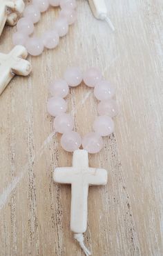 Mini rosary favors baptism favors for girls cross favors | Etsy Spiritual Cross Rosary Bracelet For Baptism, Pink Spiritual Jewelry For Blessing, White Cross Rosary Bracelet As Gift, White Cross Rosary Bracelet Gift, Handmade Pink Rosary For First Communion, Mother's Day White Spiritual Rosary, Spiritual Cross Rosary For Confirmation, White Spiritual Rosary For Mother's Day, Pink Rosary With 8mm Beads As Gift