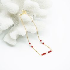 Handmade red coral and seed pearls bracelet in gold filled with a delicate design. We have a passion for ocean gemstones because water is the origin of life. A designer touch as an everyday elevation. It will add an elegant and delightful touch to any look. ⚜ Specs❀ Gold Filled Chain and Extenstion; Gold Plated Clasp❀ Red Coral Dyed from Natural White Coral❀ 6 Seed Pearls❀ Length: 18 - 21cm (7-8 Inch) Adjustable Pearls Bracelet, Asian Jewelry, White Coral, Delicate Design, Plum Blossom, Seed Pearl, Golden Globes, Red Coral, Gold Filled Chain