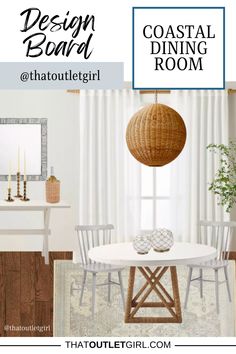 a dining room with white chairs and a round table