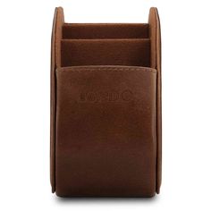 a brown leather pen holder with the word london on it's front and bottom