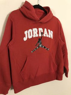 2000s Michael Jordan Jumpman Nike Hoodie, Red Youth Large. Condition is "Pre-owned". Shipped with USPS Priority Mail. A few spots on back, otherwise very clean! Nike Hoodie With Letter Print, Nike Hooded Hoodie For Sports Season, Nike Hoodie With Logo Print For Fall, Nike Long Sleeve Hoodie With Logo Print, Nike Hoodie With Letter Print For Sports Season, Red Hooded Top For Sports Season, Red Hooded Sports Top, Nike Cotton Hoodie With Letter Print, Nike Fleece Hoodie With Letter Print