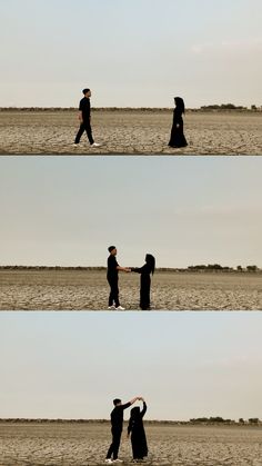 two people are walking in the desert holding hands