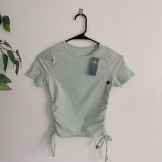 Never Worn! Great Condition! Spring Workout Ruched Tops, Fitted Athleisure Tops With Drawstring, Casual Drawstring Workout Tops, Sporty Ruched Top For Summer, Ruched Tops For Summer Workouts, Spring Workout Tops With Drawstring, Ruched Crop Top, Hollister Tops, Mint Green