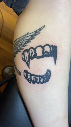 @medicinalmegz on insta, tattoo, fangs, blackwork, contrast Vampire Fang Tattoo, Pepper Shading Tattoo, Vampire Fangs Tattoo, Fang Tattoo, Nosferatu Tattoo, Fangs Tattoo, Vampire Teeth Tattoo, Lost Boys Tattoo, Insta Tattoo