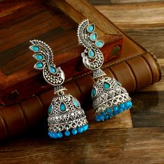 Overview These stylish Earrings set from JewelryTrack will certainly leave you spellbound. These Earrings set have an excellent finish and gives out an exquisite sense of style. If you are looking for an amazing Fashion Jewelry set for special occasions such as Anniversary, Engagement, Party, Wedding or for gifting , then your search ends here.  Item Description Item: Oxidized Silver Plated Handmade Jhumki Earrings COLOR : Silver OCCASION: PARTY WEAR , WEDDING, MARRIAGES, CASUAL, DAILY WEAR Ideal For Gifting Please contact us for Bulk Orders. Seller Info: We are Aiming to supply best products to customers at best price. We believe good product nothing without good customer service. We always there for any query or help understanding something. Payment: We accept Payment Only Via PayPal ,It Blue Jhumkas With Latkans Drop Earrings, Blue Earrings For Diwali, Blue Jhumkas For Festive Occasions, Blue Jhumkas With Latkans For Diwali, Blue Bohemian Jhumkas For Festive Occasions, Diwali Blue Jhumkas With Latkans, Festive Blue Bohemian Jhumkas, Festive Bohemian Blue Jhumkas, Blue Temple Jewelry Earrings With Latkans