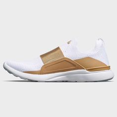 Women's TechLoom Bliss Black / Vanilla / Ivory | APL Shoes Modern Slip-on Running Shoes For Light Sports, Modern Slip-on Running Shoes For Casual Sports, Athleisure Running Shoes With Abzorb Midsole For Training, Training Running Shoes With Abzorb Midsole, Athleisure Slip-on Running Shoes With White Sole, Modern White Slip-on Running Sneakers, Modern Running Shoes With Ortholite Insole For Light Sports, White Slip-on Running Shoes For Light Exercise, White Functional Slip-on Running Sneakers