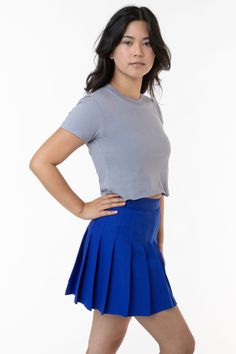 The Fine Jersey Crop Top features a raw hem, ribbed crew neck, and short sleeves. A narrow fit sits right at the waist and pairs perfectly with high waisted styles! Made in Los Angeles, Calif. Our experienced sewers earn up to $25 an hour and no less than $16; additionally workers have healthcare benefits for less than $15 per week, a 401k plan, paid sick days, subsidized bus passes and favorable overtime benefits. | Fine Jersey Crop Top for Women in Fuchsia, Size 2XL Jersey Crop Top, Denim Short Jumpsuit, La Outfits, Tennis Skirts, High Waist Fashion, Cute Fit, Cute Crop Tops, Basic Shirts, Off White Color