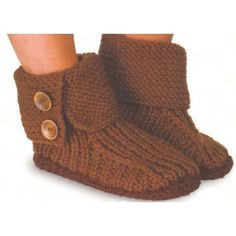 a pair of brown knitted boots with buttons