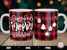 two coffee mugs with christmas designs on them, one is red and the other is black