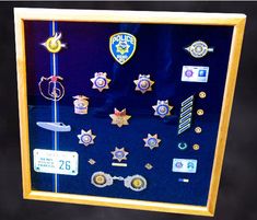 a display case with various police badges on it