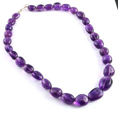 AAA Quality Natural Amethyst Smooth Tumble Shape Beads Necklace , Amethyst Dark Purple Smooth Nacklace , 11mmX12mm to 16mmX20mm SKU-BBI1978 Gemstone - Amethyst Beads Size - 11mmX12mm to 16mmX20mm Inches - 16 Inch Beads in a strand - 30 Beads - Smooth Shape - Oval Tumble SKU - BBI1978 Handmade Rondelle Jewelry We are Manufacturer of All Kind of Gemstones Beads & Jewelry. SHIPPING POLICIES : EXPRESS : FEDEX/UPS (Delivery with in week) HIGHLY RECOMMENED! During Checkout please select Delivery Upgra Purple Jewelry With Polished Oval Beads, Purple Oval Beads For Jewelry Making, 16 Inch Necklace, Necklace Amethyst, Rainbow Gemstones, Gemstone Beads Jewelry, Necklace Bead, Rainbow Jewelry, Gemstone Beaded Necklace