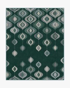 a green rug with white and grey designs on the front, in an abstract pattern