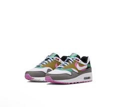 Elevate your sneaker game with these Nike Air Max 1 SE sneakers in black and pink. These sneakers are perfect for women who want to add a pop of color to their athletic look. The black base is accented with pink details, making these shoes both stylish and trendy. With a UK shoe size of 8.5 and US shoe size of multi, these sneakers are designed to fit comfortably. The Nike Air Max 1 model is known for its durability and support, making it a great choice for athletes. These sneakers are perfect for any active woman who wants to look and feel great while exercising or running errands. Pink Nike Air Max Casual Sports Shoes, Multicolor Low-top Nike Air Max For Sports, Sporty Nike Air Max In Pink, Pink Nike Air Max Synthetic For Sports, Pink Nike Air Max Synthetic Sports Shoes, Athletic Looks, Sneaker Games, Air Max 1, Active Women