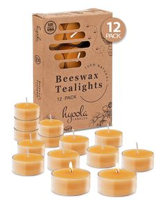 twelve beeswax tea lights in a cardboard box with 12 packs of each candle