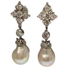 GIA Certified cultured pearl and diamond earrings are beautifully handmade. The details are as follows : Diamond weight : 1.30 carat approx ( GH color and VS clarity ) Measurements (earrings ) : 1 1/4 inches long Pearl description : quantity - 2 weight : 6.20 grams Measurements: 9.06 - 8.93 mm and 9.09 - 8.82 mm color : white Rings Luxury, 18k Gold Earrings, Pearl And Diamond Earrings, Diamond Dangle Earrings, White Gold Earrings, Pearl Diamond, Lovely Jewellery, Gold Drop Earrings, Dream Jewelry