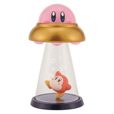 the nintendo mushroom lamp is pink and gold