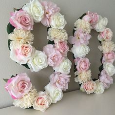 flowers arranged in the shape of the word love