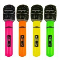 four different colored microphones are lined up