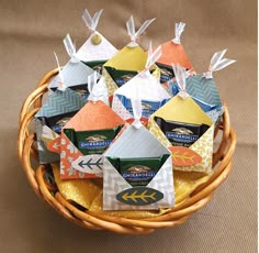 a basket filled with small origami birds