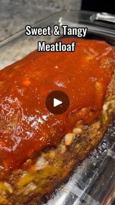 the meatloaf is covered in sauce and ready to be cooked on the grill