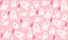 a pink background with white ghost faces and stars on them, all over the place