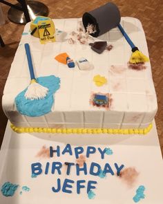 a birthday cake that has been made to look like it is being used for cleaning