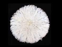 White Feathered Hat from the Bamileke People of Cameroon. During festivals at the palace, the King and other high-ranking officials would wear feather headdresses to demonstrate their power and prestige. 36" diameter. Feathered Hat, Ju Ju, Headdress