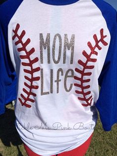 a baseball shirt that says mom life on it