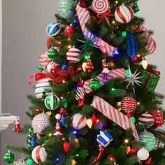 a christmas tree decorated with ornaments and lights