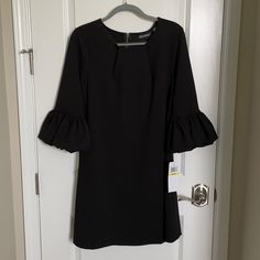 Nwt-Nina Leonard Black Dress With Gold Zipper Detail On The Back. 3/4 Sleeves With Tulip Sleeve. Very Well Made And Has Some Stretch To The Fabric As Well Size: M Bust: 19.5in Shoulder To Hem: 36in Elegant Black Dress With 3/4 Sleeves, Black Midi Dress With 3/4 Sleeves For Office, Black Bell Sleeve Dresses For Spring, Casual Black Bell Sleeve Dress, Casual Black Dress With Bell Sleeves, Black Midi Dress With 3/4 Sleeve, Black Half Sleeve Midi Dress For Work, Chic Black Half Sleeve Dresses, Black Midi Dress With 3/4 Sleeve For Spring