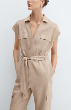 Cargo style is coming in hot right now, and this linen jumpsuit is a one-and-done way to wear the trend. V-neck with spread collar Sleeveless Chest flap-patch pockets; cargo flap-patch pockets Removable sash Cotton lining 100% linen Dry clean or machine wash, line dry Imported Cargo Jumpsuit, Overall Jumpsuit, Traje Casual, Linen Jumpsuit, Long Jumpsuits, Cashmere Coat, Personal Stylist, Kate Middleton, Light Beige