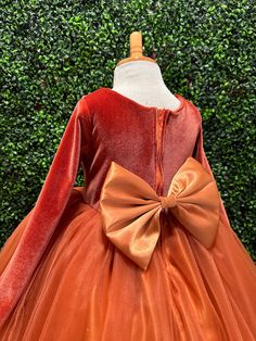 Our enchanting Ankle Length flower girl dresses are sure to turn heads! This beautiful elegant sophisticated dress is handmade, the bodice consists of Burnt Orange Velvet material with long sleeves. The bow is made of satin and it's easily detachable. The skirt consists of 4 layers of tulle, followed by lining and crinoline for fullness.  This dress is perfect for any occasion!  Dress Is Pictured with a petticoat NOT INCLUDED https://www.etsy.com/listing/1305138635/white-ankle-length-petticoat-wedding?click_key=50d449c187c9e82c565249da914d7ed38b32b9f7%3A1305138635&click_sum=17db9314&ref=shop_home_active_2 Visit our store, more items to come!  https://www.etsy.com/shop/LittledarlnBoutique?ref=profile_header CUSTOM MEASUREMENTS AVAILABLE All custom orders are final sale, please message me go Elegant Red Bridesmaid Princess Dress, Elegant Long Sleeve Ball Gown For Dress-up, Red Long Sleeve Pageant Dress, Burnt Orange Velvet, Wedding Church, Orange Velvet, Elegant Sophisticated, Profile Header, Sophisticated Dress