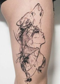 a woman's thigh with an abstract tattoo design on the side of her leg