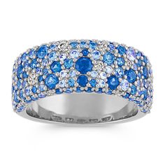 Crafted in quality 14 karat white gold  121 round blue sapphires in various hues of blue (approx. 2.47carats TW) and 16 brilliant round diamonds (approx. .20 carat TW) create this gorgeous cluster fashion ring. The total gem weight is approximately 2.67carats and is 8.8mm wide. Pink Sapphire Diamond Ring, Diamond Sapphire Ring, Blue Sapphire Diamond Ring, Sapphire Diamond Pendant, Multicolor Jewelry, Sterling Silver Jewelry Rings, Sapphire And Diamond Ring, Multi Sapphire, Natural Diamond Ring