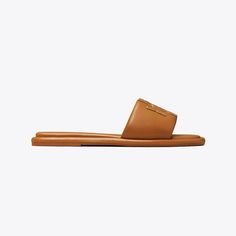 Chic comfort. The sport slide is made of soft padded leather that hugs the foot, with a cushioned foam insole for flexible support. The raised Double T is edged in metallic trim for subtle shine. Most Comfortable Sandals, Soft Sandals, Miller Sandal, Square Toe Sandals, Woven Sandals, Tory Burch Sandals, Wide Shoes, Jelly Sandals, Footwear Design Women