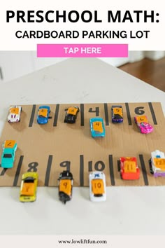 a cardboard parking lot with cars on it and the words preschool math card board parking lot