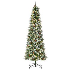 a white christmas tree with red berries and lights on it's base, in front of a white background