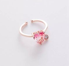 Crystal light pink ring with a rhinestone attached! Hard not to love. Adjustable Ring.Gold Plated. Tarnish-free. Rings 2022, Ring Party Jewelry, Flower Rings, Zircon Ring, Elegant Flowers, Rings For Girls, Pink Ring, Fashion Mode, Open Ring