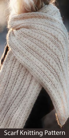 a woman wearing a white knitted scarf with text overlay that reads, scarf knitting pattern