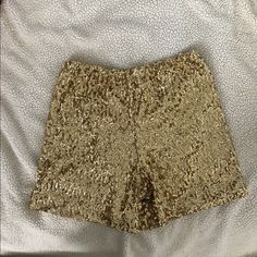 Never Worn - Sequin Shorts Lined Inside. All Over Stretch And Run Big! Gold - Lined Inside W/White Material -Size 16/18 4in Inseam 32in Waist Unstretched Gold Stretch Shorts For Night Out, Gold Stretch Bottoms Short Length, Gold Stretch Short Bottoms, Gold High-waisted Shorts For Party, Casual Gold Shorts For Night Out, Casual Gold Bottoms Short Length, Casual Gold Shorts, Gold Casual Short Length Shorts, Sequin Shorts