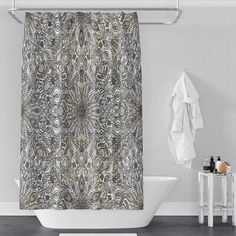 a bathroom with a bathtub and shower curtain