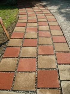 a chair sitting on top of a brick walkway