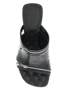 Step out in style and comfort with these glossy leather peep mules. The silver-tone metal zip openings add a touch of edge to these chic and sophisticated shoes, while the quilted leather insole and covered stiletto heel provide both comfort and style. Plus, the leather sole with contrasting engraved equestrian knight design adds a unique and luxurious touch to complete the look. Crafted in glossy leather Two silver-tone metal zip openings Quilted leather insole Covered stiletto heel Leather sol Burberry Heels, Statement Sandals, Knight Design, Leather Cap, Pumps Flat, Beach Tote Bags, Quilted Leather, Handbag Backpack, Stiletto Heel