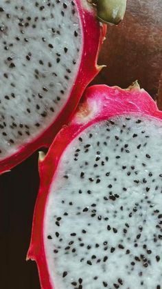 the fruit is cut in half and ready to be eaten