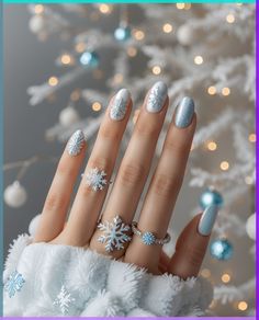 Embrace the wintry charm with a base of icy blues and snowy whites, adorning your nails with delicate snowflake patterns or shimmering silver accents. Dive into a variety of designs, from elegant frosty tips to playful holiday motifs, offering a spectrum of enchanting choices for your winter-inspired manicure! White Winter Nails, Snowflake Patterns, Winter Manicure, Blue Nail Designs, Snowflake Nails, White Nail Designs, Winter Nail Art, Silver Nails